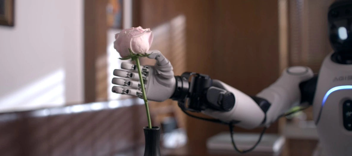 Original Lite-S hand arranging a rose in a vase